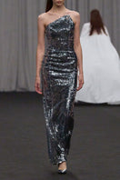 Lili Blanc asymmetrical neckline sequin gown with elegant design, featuring shimmering sequins and a stylish silhouette.