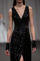 Lili Blanc glamorous sleeveless sequin gown with a fitted bodice and flowing skirt, perfect for evening events.