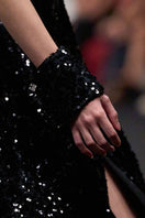 Lili Blanc glamorous sleeveless sequin gown with a fitted bodice and flowing skirt, perfect for formal events.