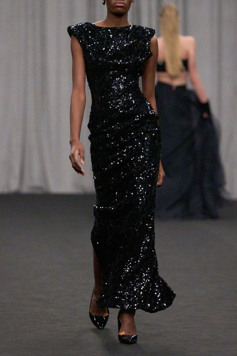 Elegant Lili Blanc sculpted sequin gown with fitted silhouette and shimmering embellishments, perfect for formal occasions.