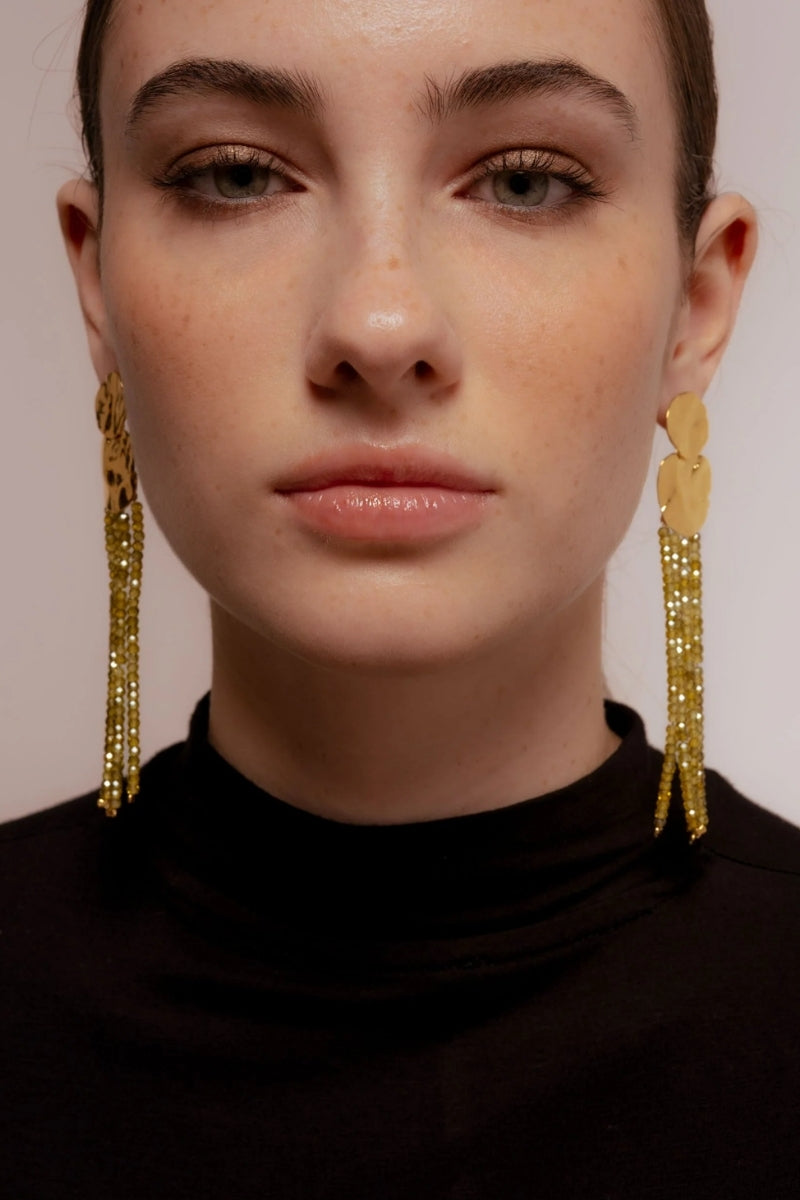 Lavani Jewels Liliana green earrings featuring intricate design and vibrant green gemstone details.