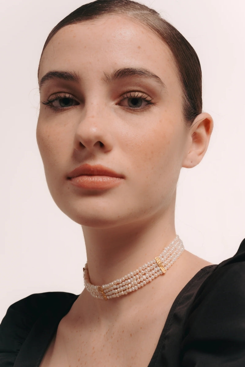 Elegant LAVANI JEWELS Liliana Pearl Choker necklace featuring a delicate pearl design on a sleek chain.