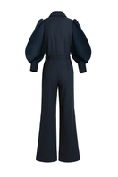 Navy blue Lilianne jumpsuit by ANA + MARIA featuring a fitted bodice and wide-leg pants, displayed on a ghost mannequin.