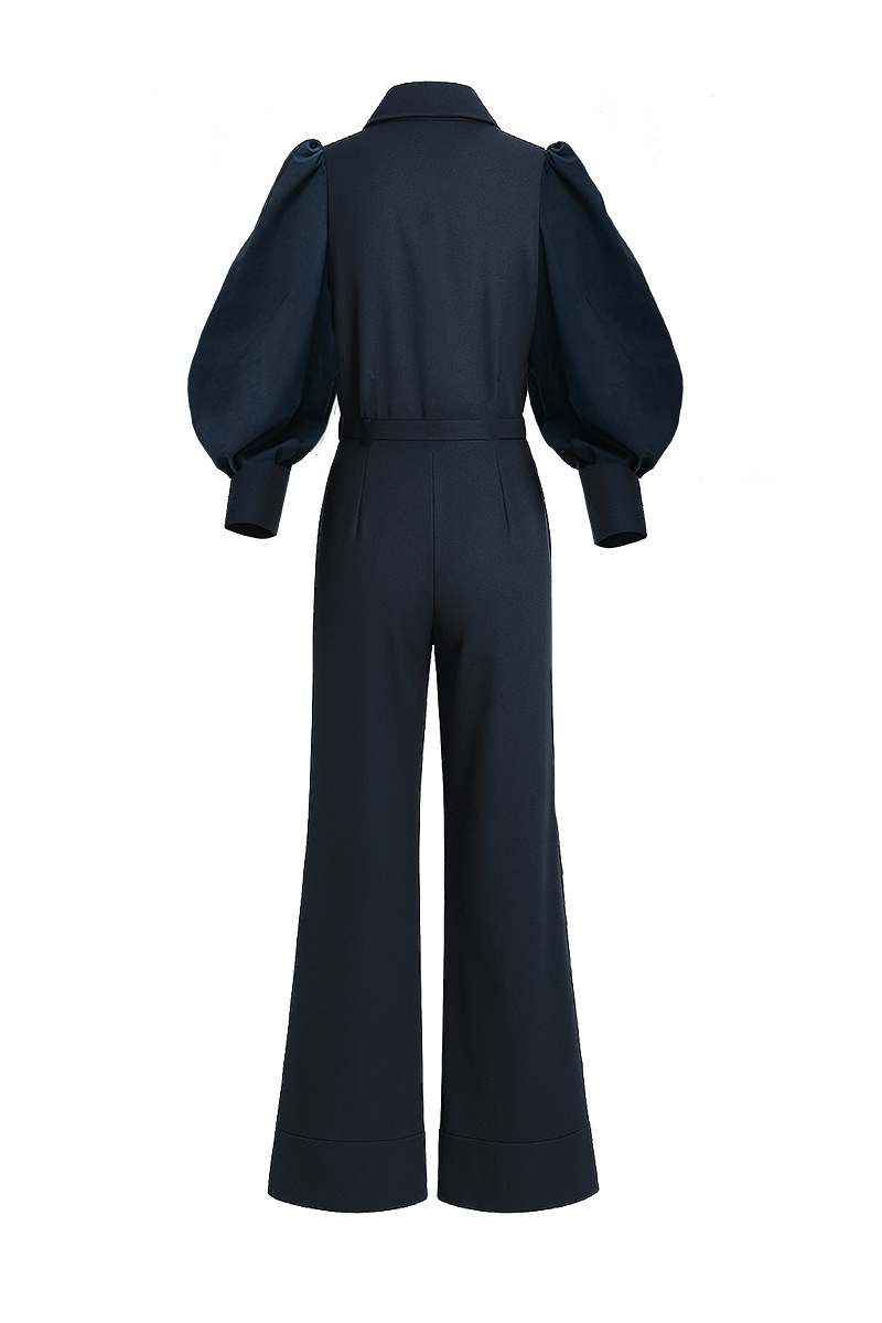 Navy blue Lilianne jumpsuit by ANA + MARIA featuring a fitted bodice and wide-leg pants, displayed on a ghost mannequin.