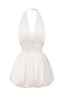 White Nana Jacqueline Lilliana halter mini dress shown from the back, featuring a stylish halter neckline and fitted silhouette.
