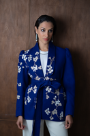 Nadya Shah Lily Fleur de Cerisier jacket featuring floral design, lightweight fabric, and tailored fit, displayed on a hanger.