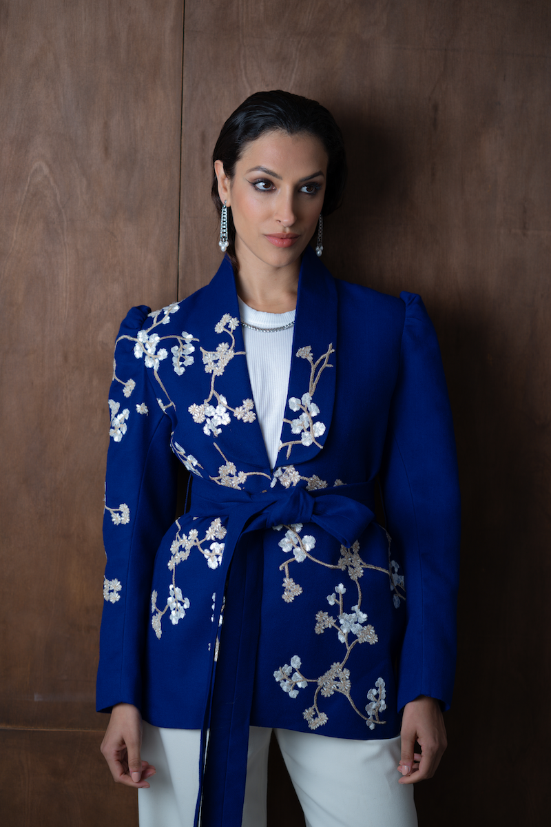 Nadya Shah Lily Fleur de Cerisier jacket featuring floral design, lightweight fabric, and tailored fit, displayed on a hanger.