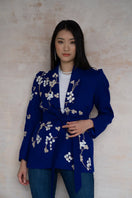 Nadya Shah Lily Fleur de Cerisier jacket featuring floral design, lightweight fabric, and stylish fit, shown on a model.