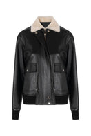 ZUT Limber bomber jacket in black, stylish men's outerwear with a ribbed collar and zip closure, displayed on a hanger.