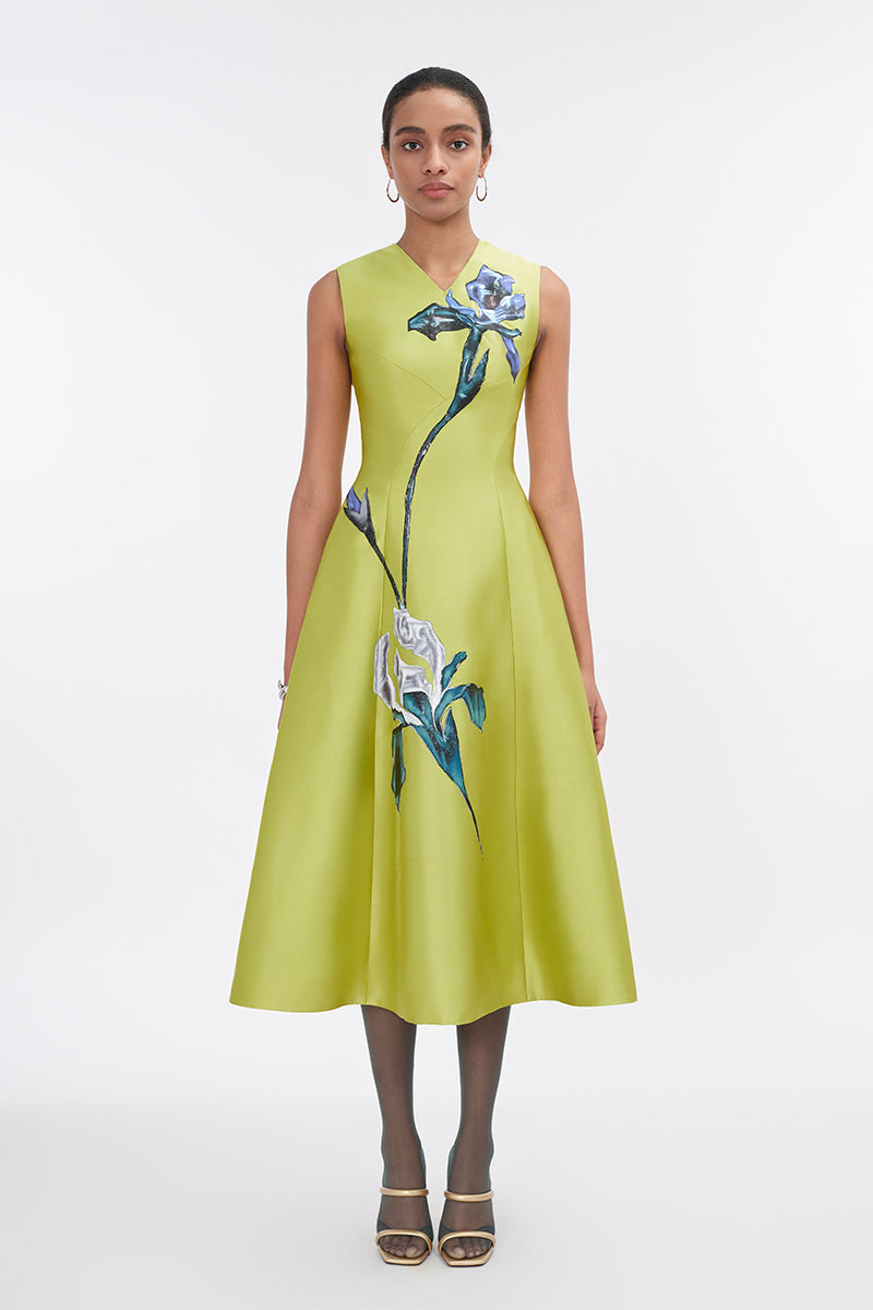 Lime green sleeveless midi dress by Tiny Ink, showcasing a fitted bodice and flowing skirt on a model.