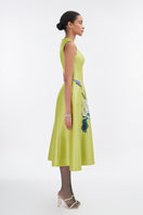 Lime green sleeveless midi dress by Tiny Ink, featuring a fitted bodice and flowing skirt, perfect for casual or semi-formal wear.