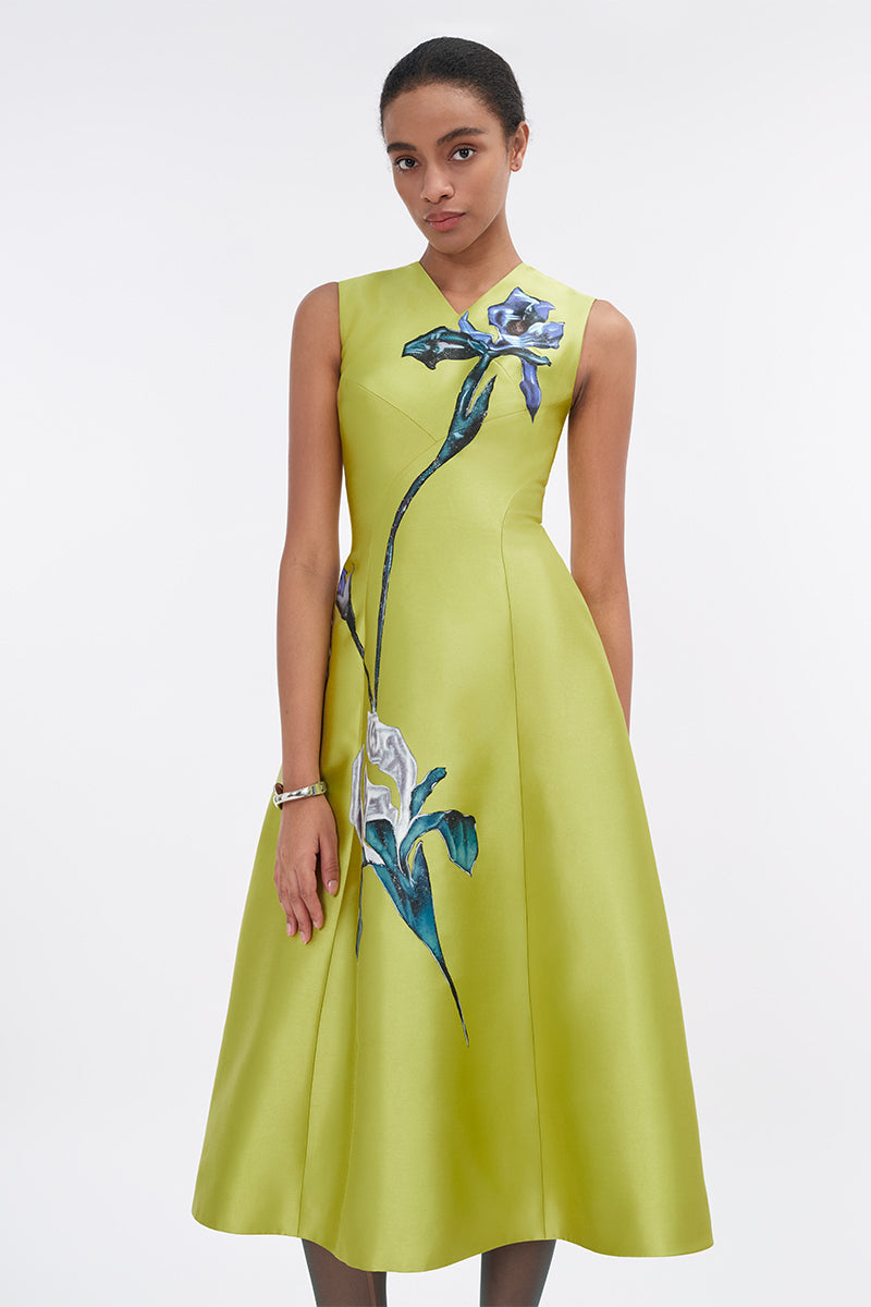 Lime green sleeveless midi dress by Tiny Ink, shown on a hanger, featuring a fitted bodice and flowing skirt for casual or dressy occasions.
