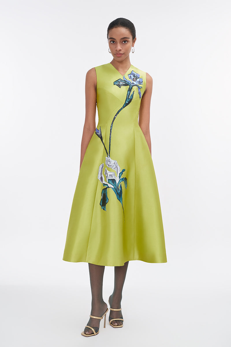 Lime green sleeveless midi dress from Tiny Ink, featuring a fitted bodice and flowing skirt, perfect for summer occasions.