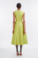 Lime green sleeveless midi dress by Tiny Ink, featuring a fitted bodice and flowing skirt, perfect for casual or dressy occasions.