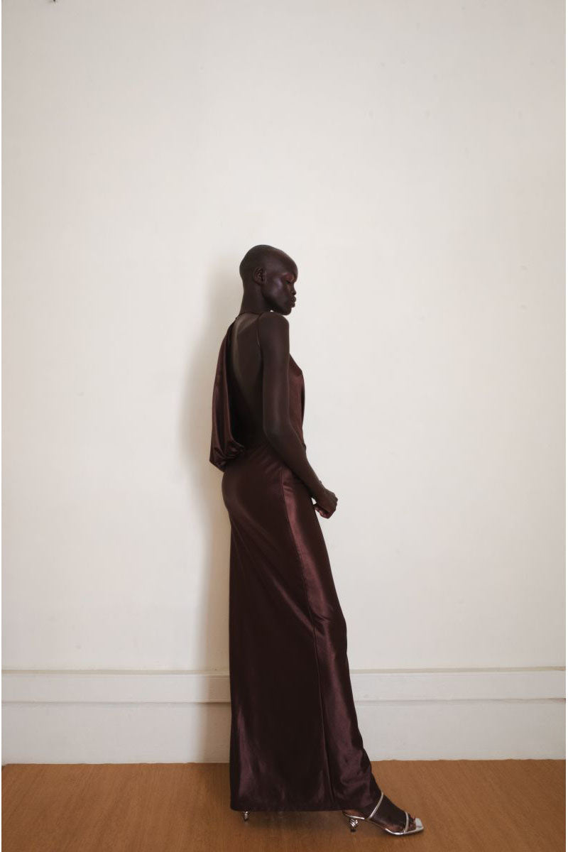 Brown Linger gown by YASSMIN SALEH, side view of a stylish maxi dress with flowing fabric and elegant design.