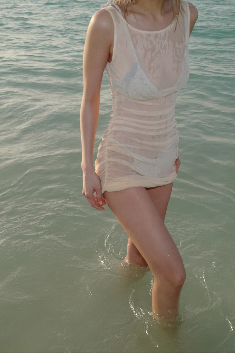 Beige Lisa Dress cover-up by Suncillo featuring lightweight fabric and relaxed fit, perfect for beach or poolside wear.