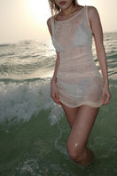 Beige Lisa dress cover-up by Suncillo, featuring lightweight fabric and relaxed fit, ideal for beach or poolside wear