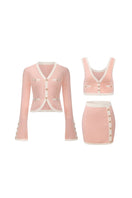 Pink Lisette knit set by Nana Jacqueline, featuring a cozy matching co-ord with a fitted top and high-waisted pants.