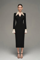 Black and beige V-neck flared cuff midi dress by I.H.F Studio, featuring long sleeves and a knee-length silhouette.