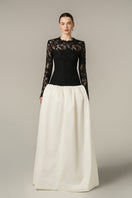 Black and white guipure lace and taffeta gown with long sleeves and a bubble hem by I.H.F, elegant evening dress.