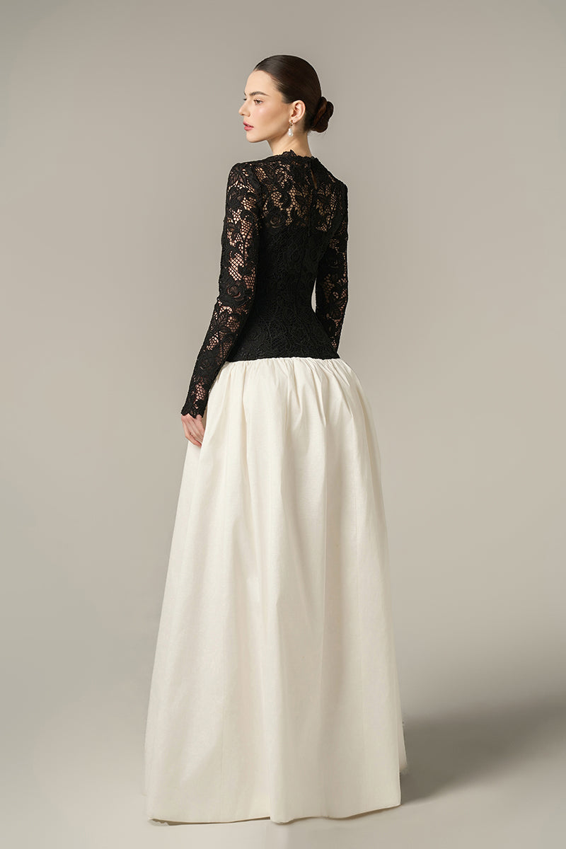 Black and white guipure lace and taffeta gown by I.H.F with long sleeves and a bubble hem, elegant evening ball gown.