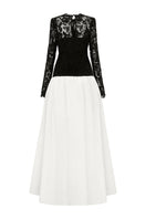 Black and white guipure lace and taffeta gown by I.H.F featuring long sleeves and a bubble hem for elegant evening wear.