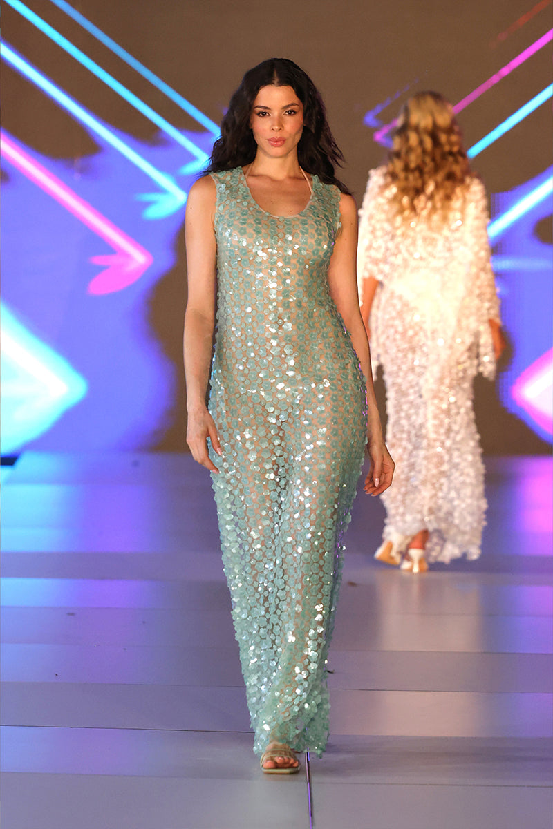 Nur Karaata Coco’s maxi dress shown in a flowing, stylish design with vibrant patterns and a comfortable fit for elegant summer wear.