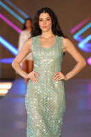 Nur Karaata Coco’s maxi dress featuring a flowing fabric and elegant design, perfect for stylish summer or evening wear.
