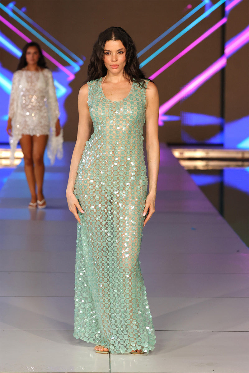 Nur Karaata Coco’s Maxi Dress displayed on a model, featuring flowing fabric and elegant design for stylish summer wear.