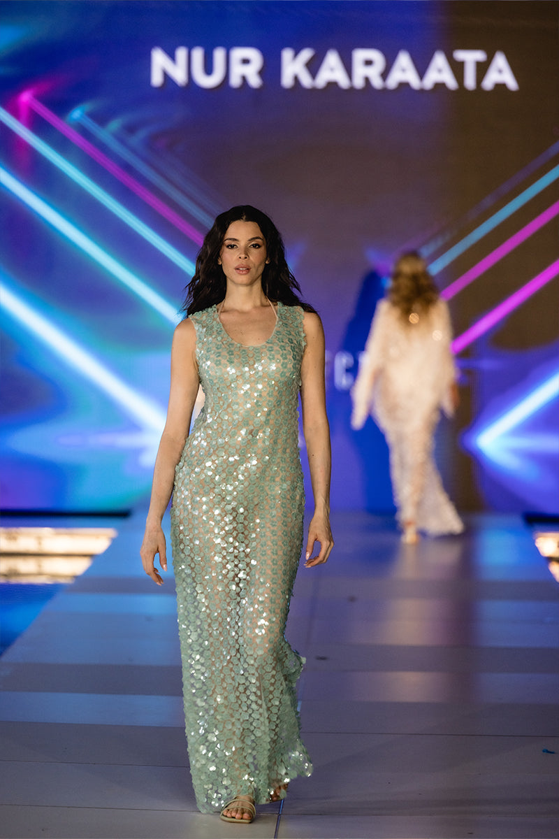 Nur Karaata Coco’s Maxi Dress featuring a flowing fabric and elegant design, perfect for stylish summer or evening wear.