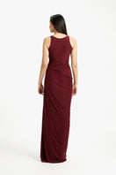 Deme By Gabriella Renata draped gown in elegant fabric, featuring a flowing silhouette and sophisticated design.
