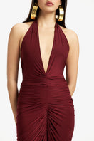 Deme By Gabriella Susan V-neck maxi dress in flowy fabric, featuring a fitted waist and elegant V-neckline.