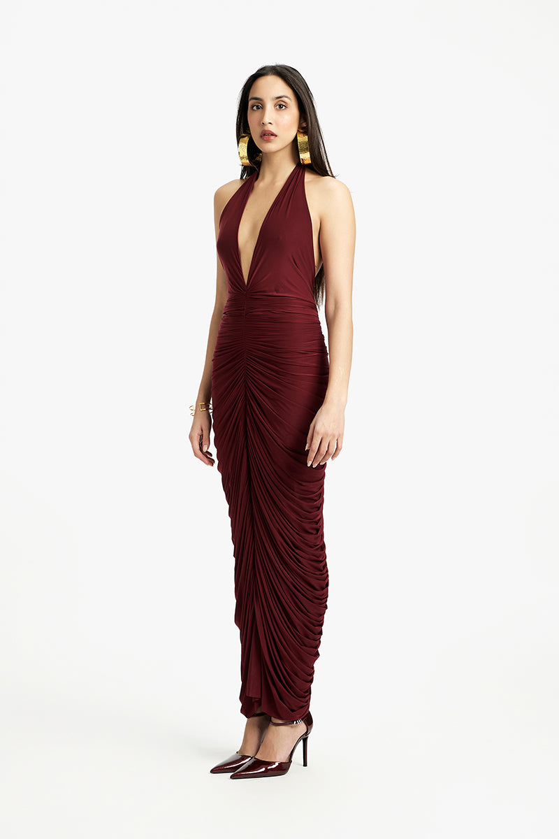 Deme By Gabriella Susan V-neck maxi dress in flowy fabric with a fitted waist and elegant length, perfect for summer or special occasions.