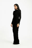 Deme By Gabriella Grace long sleeve maxi dress in flowy fabric, featuring a fitted bodice and elegant full-length skirt.