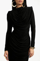 Deme By Gabriella Grace long sleeve maxi dress in elegant fabric, featuring a flowing silhouette and sophisticated design.