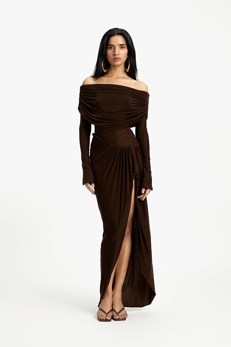 Deme By Gabriella Carmen off-shoulder maxi dress in flowy fabric with a fitted waist and elegant neckline, perfect for summer events.