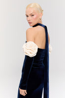 Nur Karaata Versailles Rose Navy gown with elegant floral design and flowing fabric, perfect for formal occasions.