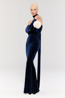 Nur Karaata Versailles Rose Navy gown featuring elegant floral design and flowing fabric, perfect for formal occasions.