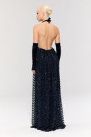 Nur Karaata Crowlight gown displayed, featuring elegant design and intricate details, perfect for formal occasions.