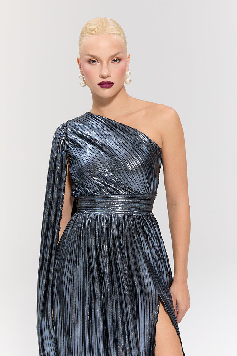 Elegant Nur Karaata Baglioni Sapphire Gown featuring flowing fabric and detailed design, perfect for formal occasions.