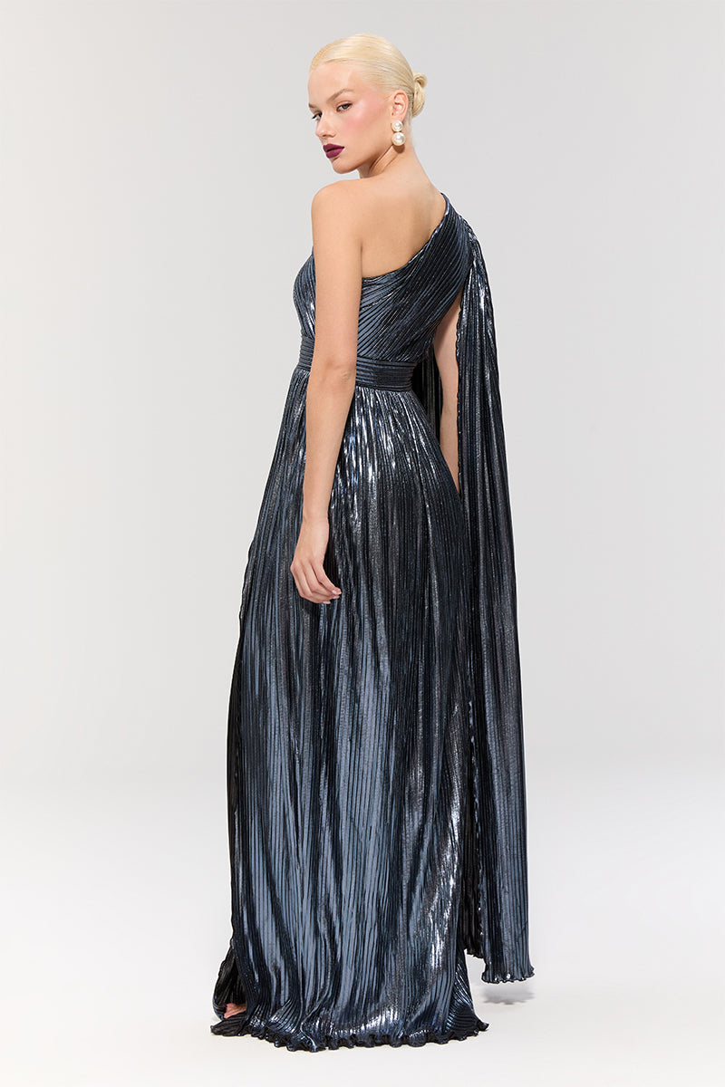 Elegant navy blue BAGLIONI SAPPHIRE gown by Nur Karaata featuring flowing fabric and intricate detailing, perfect for formal occasions.