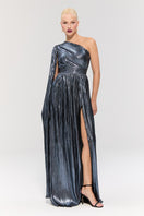 Elegant BAGLIONI SAPPHIRE GOWN by Nur Karaata featuring intricate beadwork and a flowing silhouette, displayed on a mannequin.