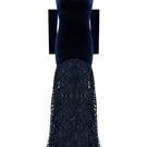 Elegant Amethyst Dynasty gown by Nur Karaata featuring intricate details and flowing fabric, showcased on a model.