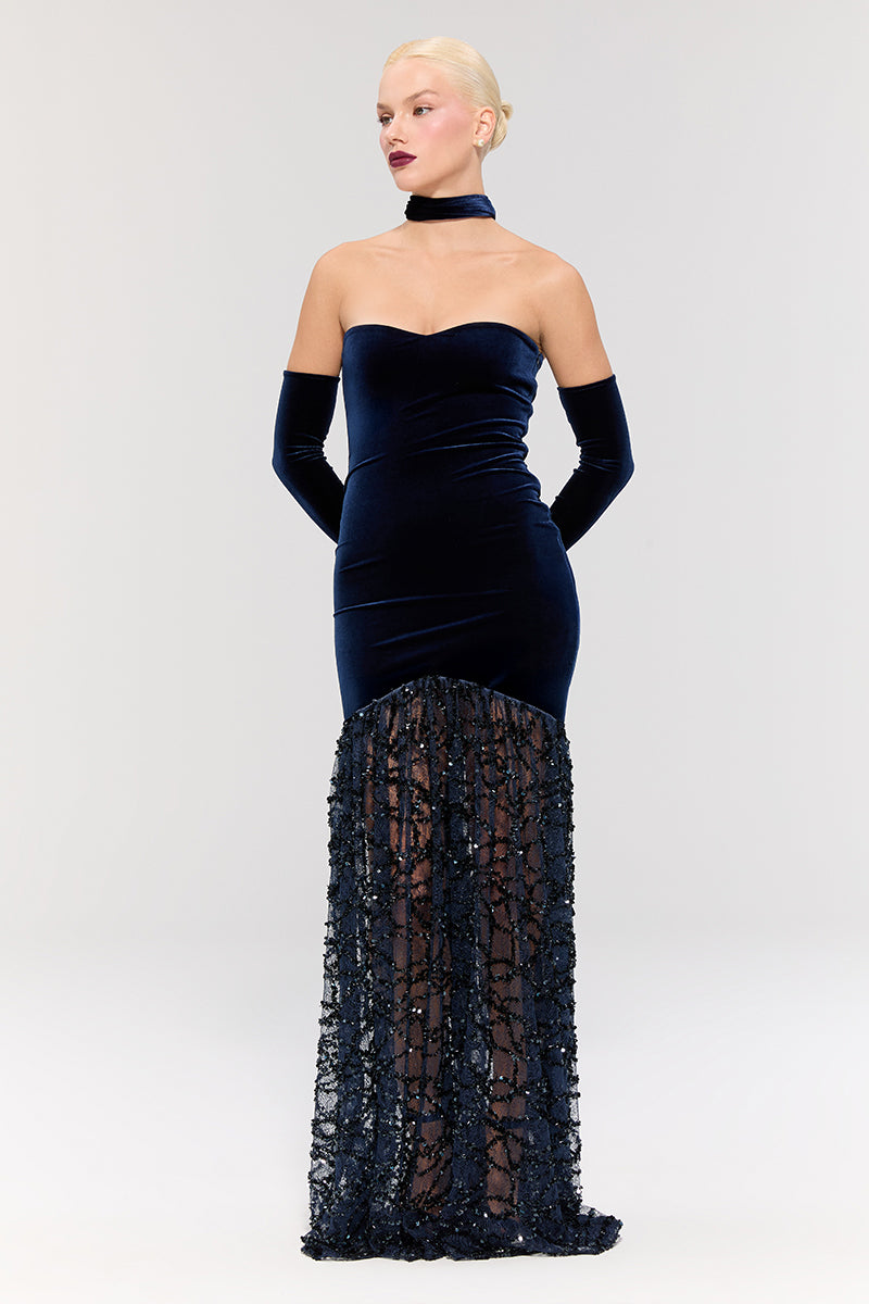 Nur Karaata Amethyst Dynasty gown featuring intricate embroidery and flowing fabric, styled for elegant occasions.