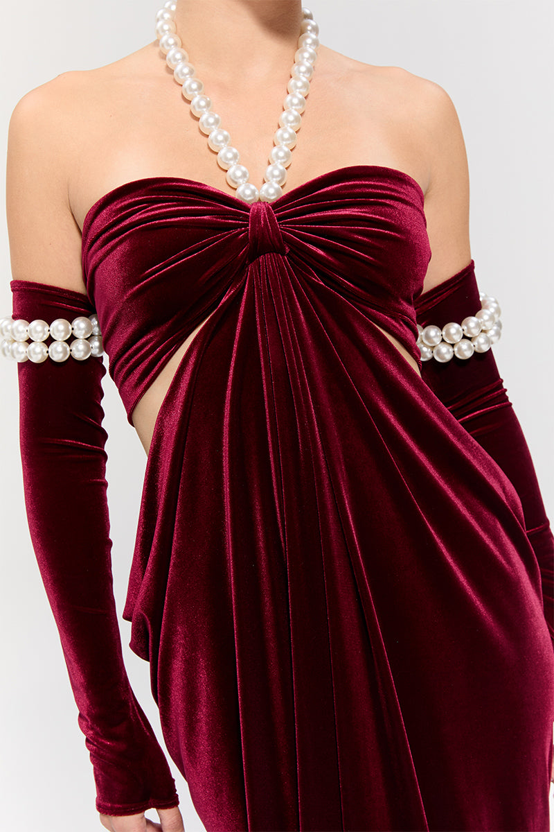 Nur Karaata Royal Ancestry Red gown, elegant evening dress with intricate details, showcased on a model in Look_39_6.jpg.