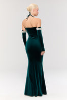 Elegant navy blue Dynasty Necklace Gown by Nur Karaata featuring intricate detailing and flowing fabric for formal events.