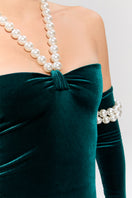 Elegant Nur Karaata Dynasty Necklace Gown featuring intricate details and flowing fabric, perfect for formal occasions.