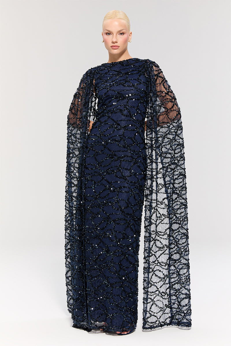 Elegant Nur Karaata Imperial Gala gown in rich fabric, featuring intricate detailing and a flowing silhouette.