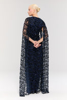 Elegant Nur Karaata Imperial Gala Gown with intricate detailing and flowing fabric, perfect for formal events.