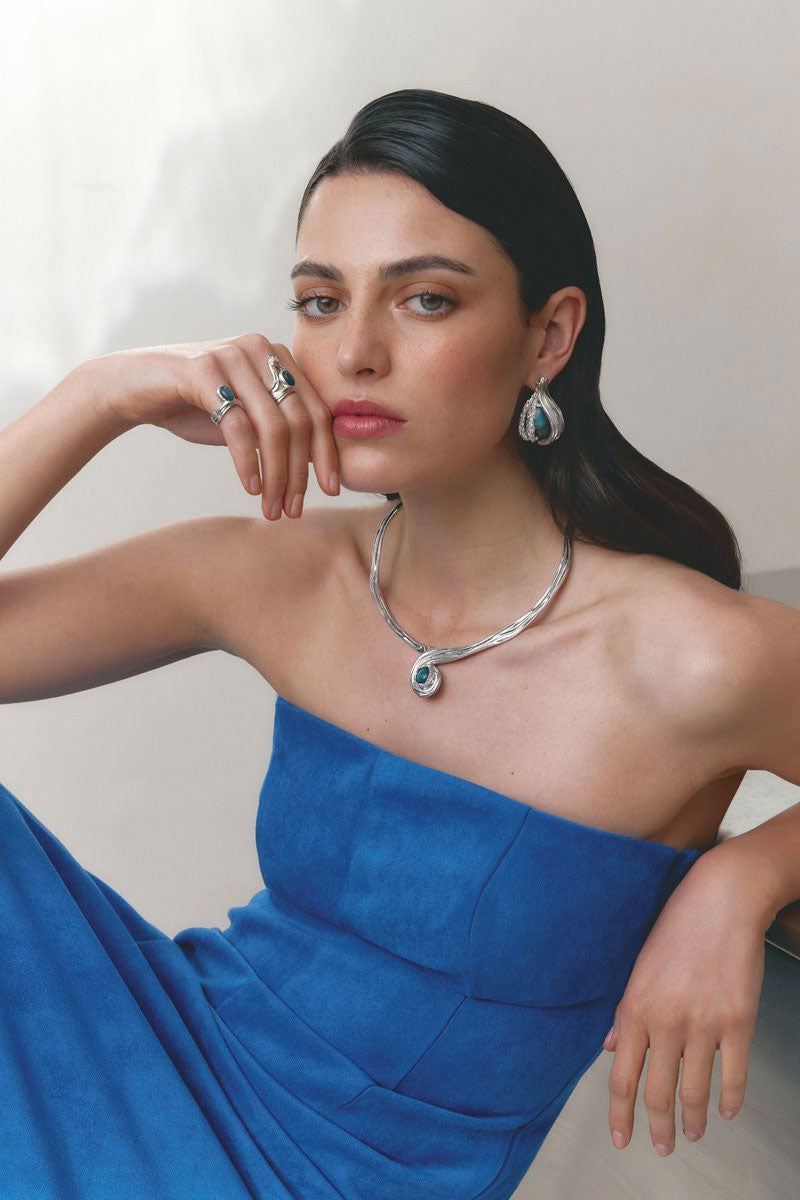 Silver and pearl interchangeable spiral necklace by Jude Benhalim, featuring a sleek loop and hoop design.